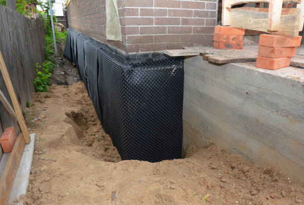 SJ Waterproofing Pros technician performing targeted Waterproofing assessment in Montpelier, IN